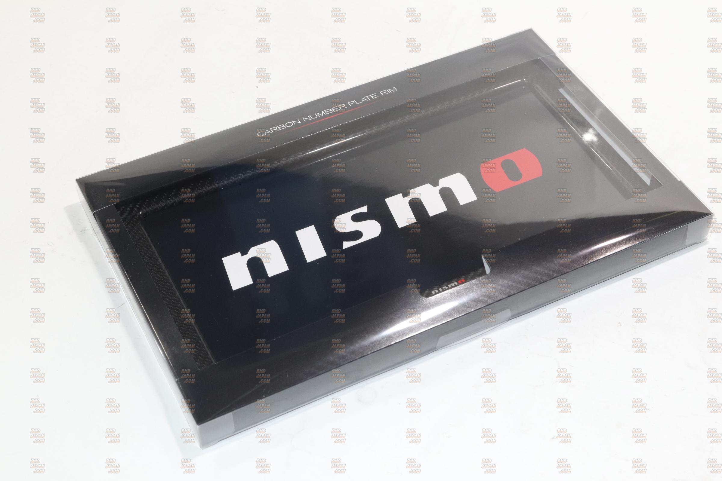 NISMO Dry Carbon Fiber Number Plate Rim Garnish Front - RHDJapan