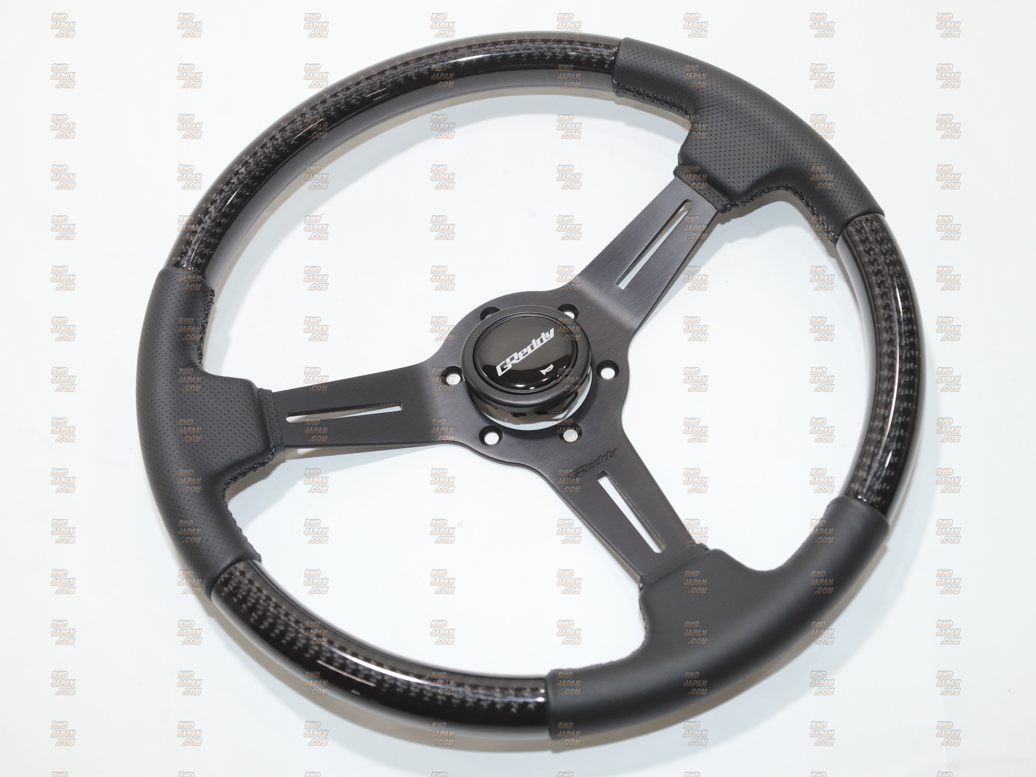Trust Greddy Sports Steering Wheel - Real Carbon - RHDJapan